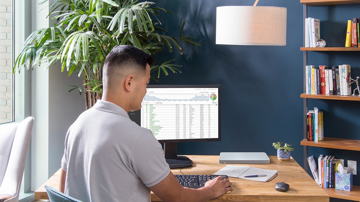 Person working from office using Cisco Meraki MX75